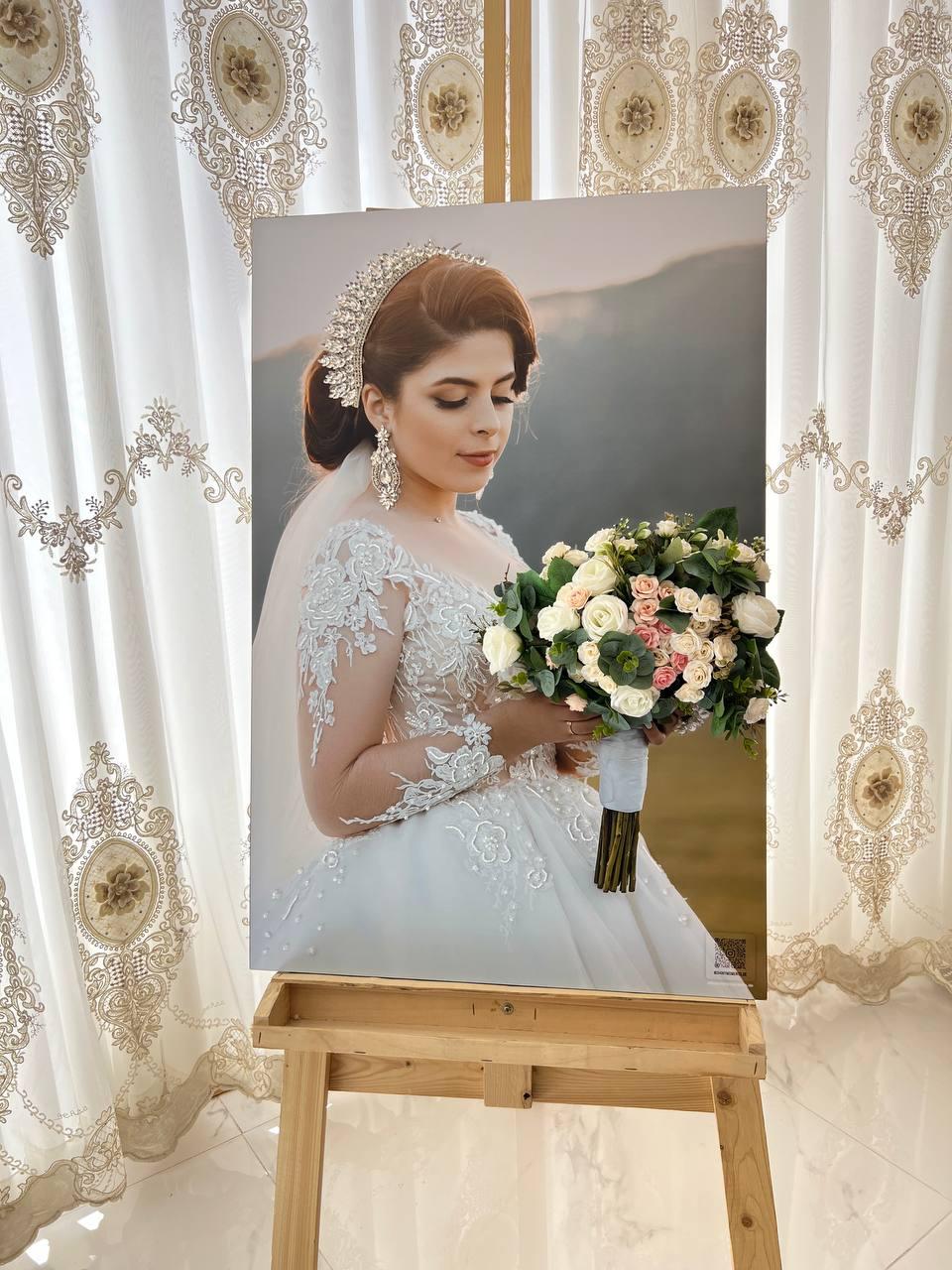 Bridal portrait print with soft golden lighting and an heirloom bouquet